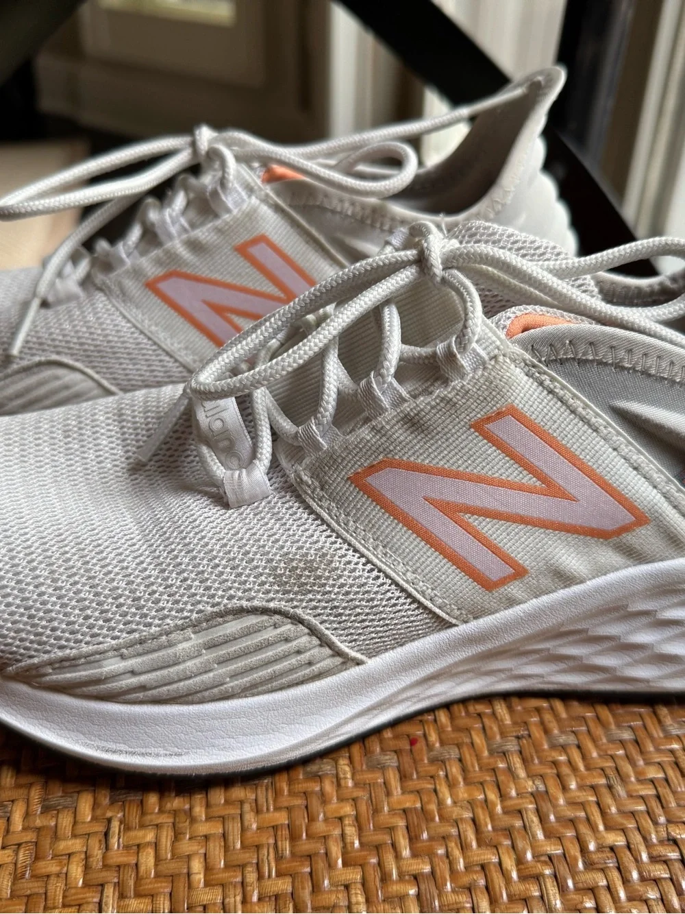 New Balance Women’s White Sneakers with Coral Accents
